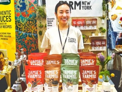 Jamie Kim repping her products at a food industry trade show.
