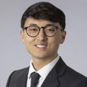 headshot of Michael Jang.