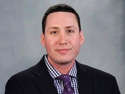 Headshot of Jason Greenberg.