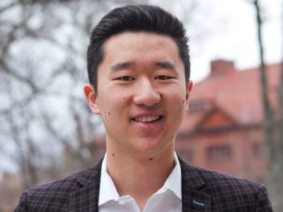 headshot of Johnny Tang.