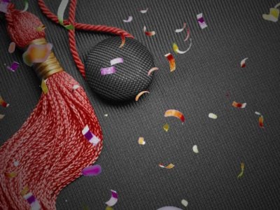 Commencement cap and tassel with confetti
