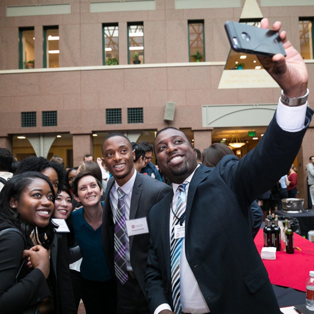 Johnson Means Business participants take a selfie in the atrium.
