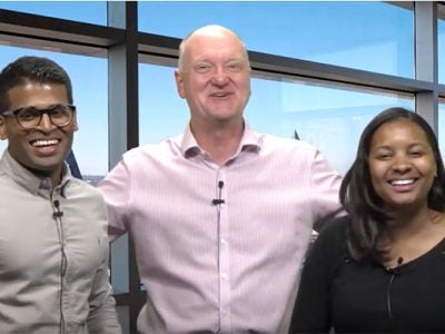 Photo of Lavan (left) with Professor Karolyi and Ola Allen-Taylor