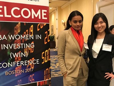 Photo of Ramona Persaud, 2017 MBA Women in Investing Conference speaker, with attendee Nicole Phang, MBA ’19.