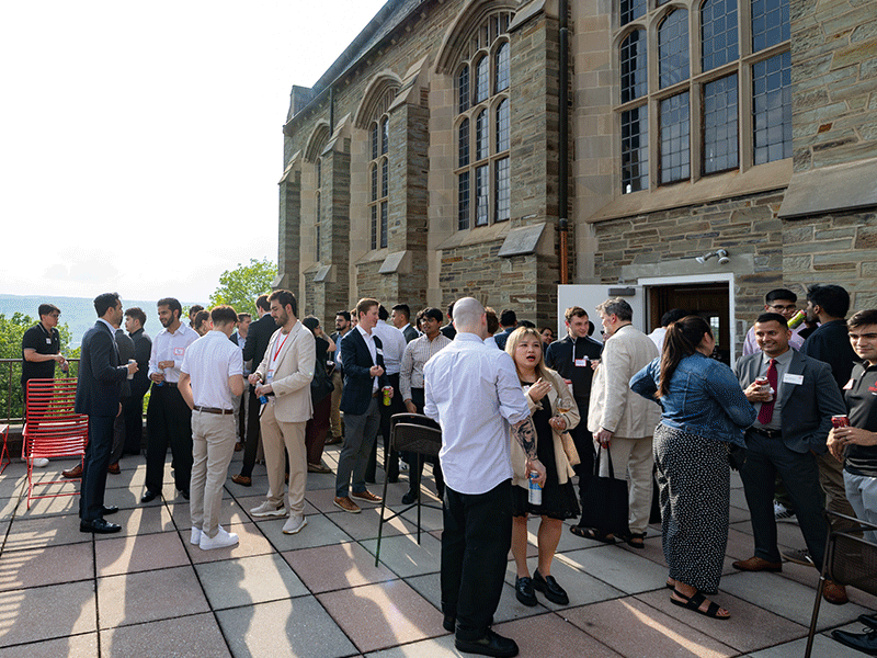 MSBA Dinner on Cornell campus outside of Willard Straight Hall patio overlooking lake