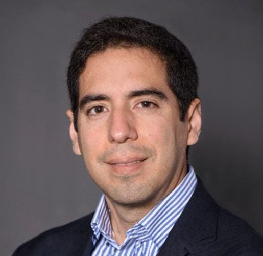Headshot of Mauricio Guerra Funes headshot.