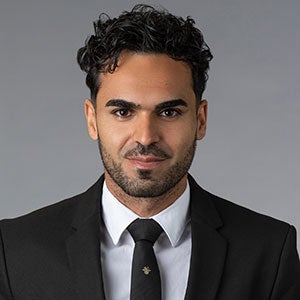 headshot of Mehmet Karakilinc.
