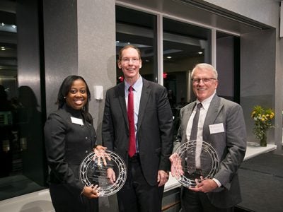 pictured left to right: Marmeline Petion-Midy '95, MBA ’00, Dean Mark Nelson, and Larry Ruff, MBA ’82