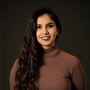 headshot of Nikita Gossain.