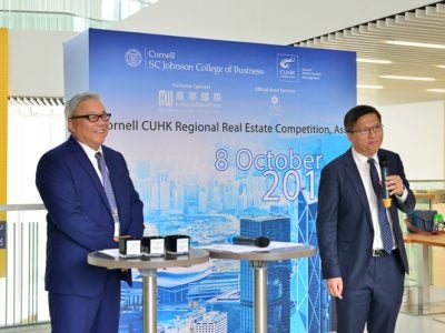 Dan Quan and the dean of the School of Hotel & Tourism Management at the Chinese University of Hong Kong
