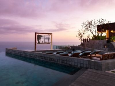 picture of an ocean resort outdoor cinema on the edge of the water at dusk