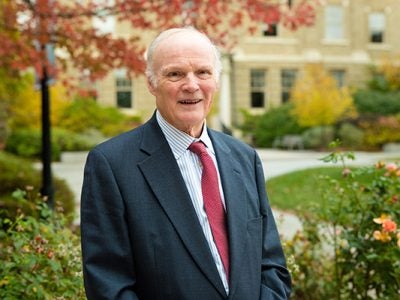Stephen Ashley posing outside on the Cornell campus