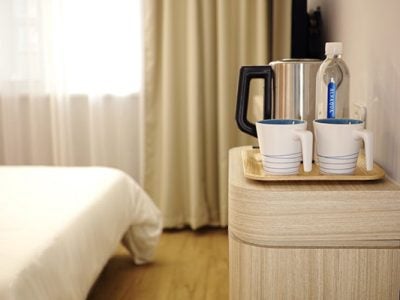 Featured photo of a hotel room for service excellence summary
