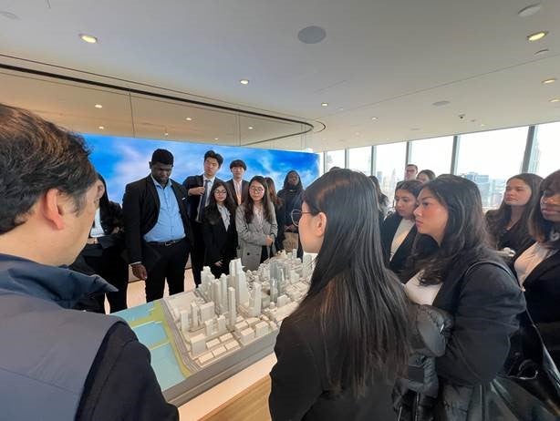 Students listening to a presentation
