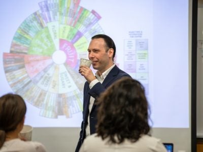 Jacob Chestnut leads a coffee tasting with his students in The Business of Coffee: From Farm to Cup.