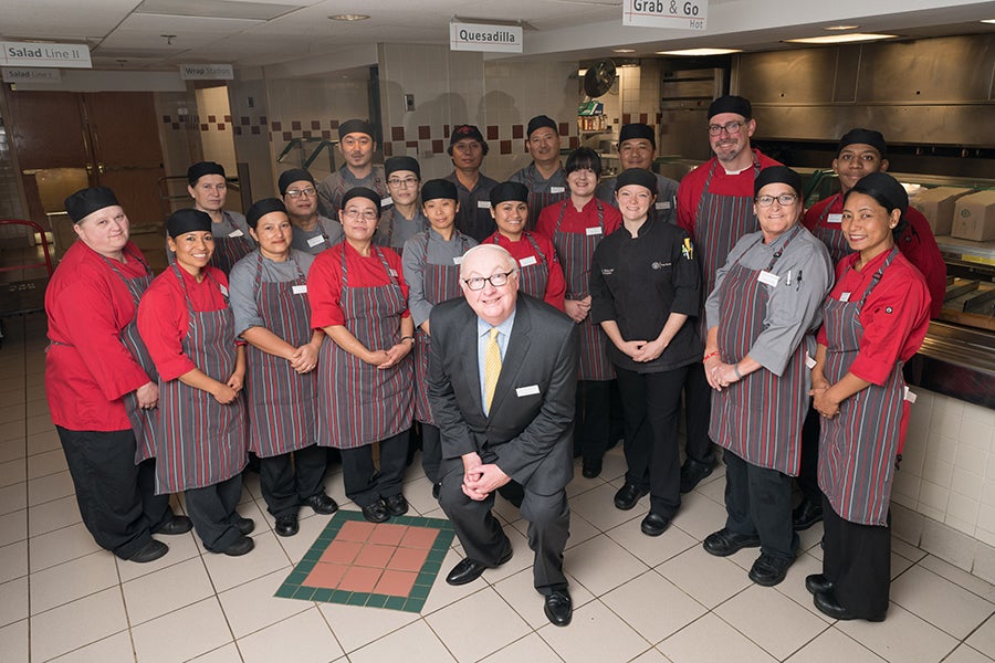 Group photo of Rick Adie and staff at the Statler Hotel