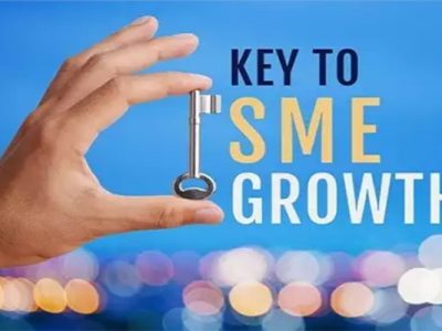 image of a hand holding a key and text: Key to SME Growth