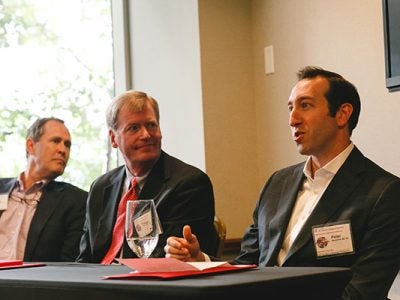 “Looking Back, Moving Forward” panel speakers. From left to right: David Tingue, MBA ’92, Dwight Vicks ’84, MBA ’91, and Peter Bernstein ’03.