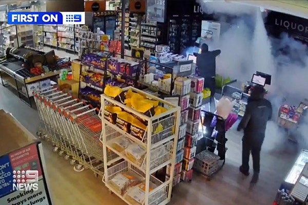 Screen shot of the interior of a small store filling up with an opaque fog.
