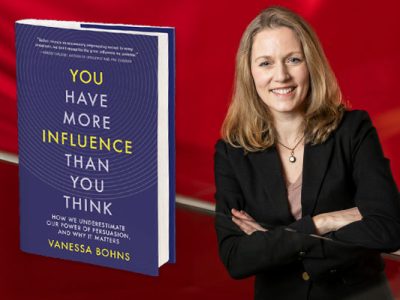 Headshot of Vanessa Bohns, net to an enlarged image of her book, on a red background.