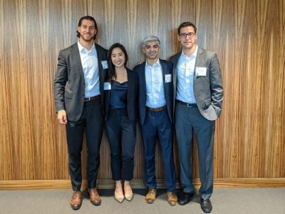 Taylor Nguyen and three teammates