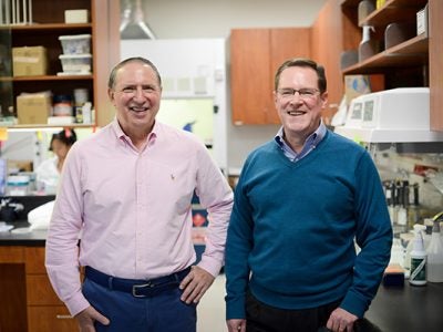 Tim Brown and Sandy Argabrite in the lab at Evolve Biosystems