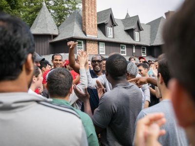 A group of students smiling at JOE