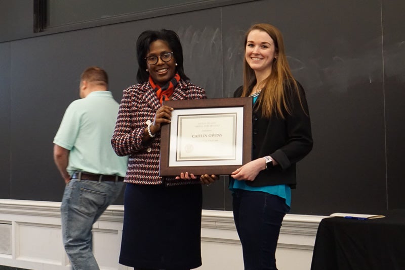Photo of Lynn and Caitlin holding a certificate