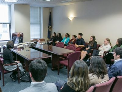 Class of ILR and SHA students listen to an arbitration case