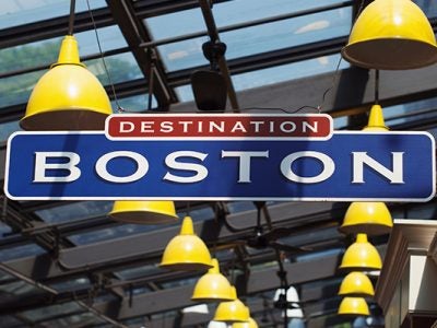 A sign in Boston that says Destination Boston