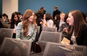Seated audience talking