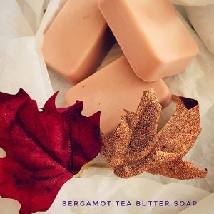 Photo of soaps, with text that says bergamot tea butter soap