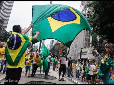 Photo of people in Brazil's streets with flags