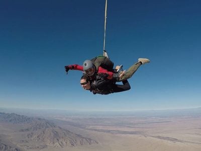 Photo of Catherine Brown skydiving during the Americas business venturing residential session