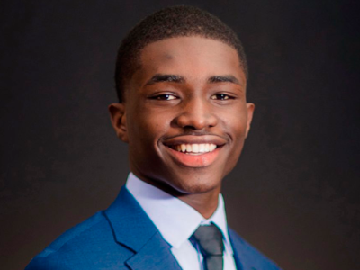 portrait of Cheick Camara ’22 in business suit