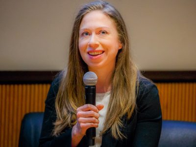 Chelsea Clinton holding a microphone