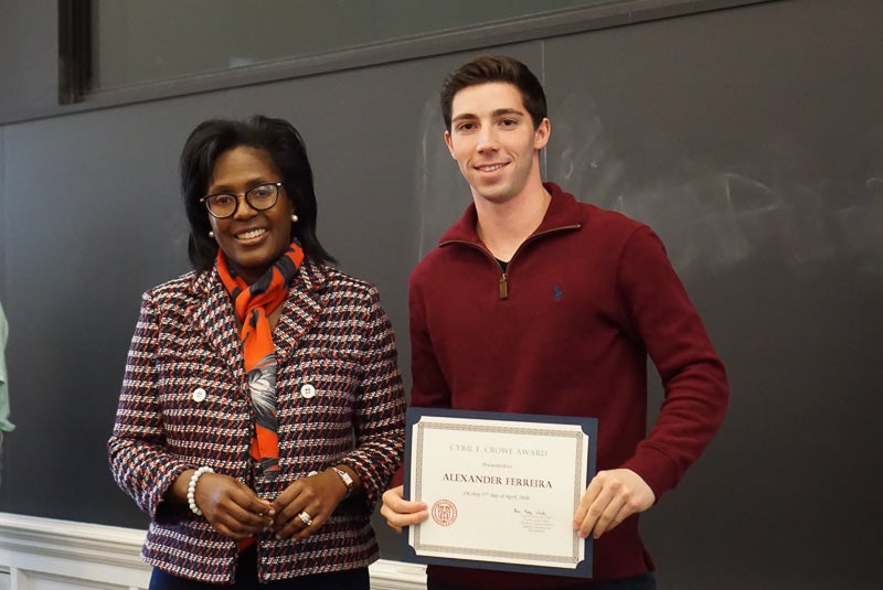 Photo of Lynn and Alexander holding a certificate