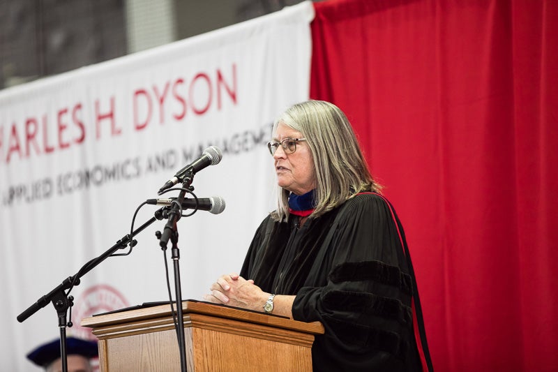 Photo of Dale speaking at a podium