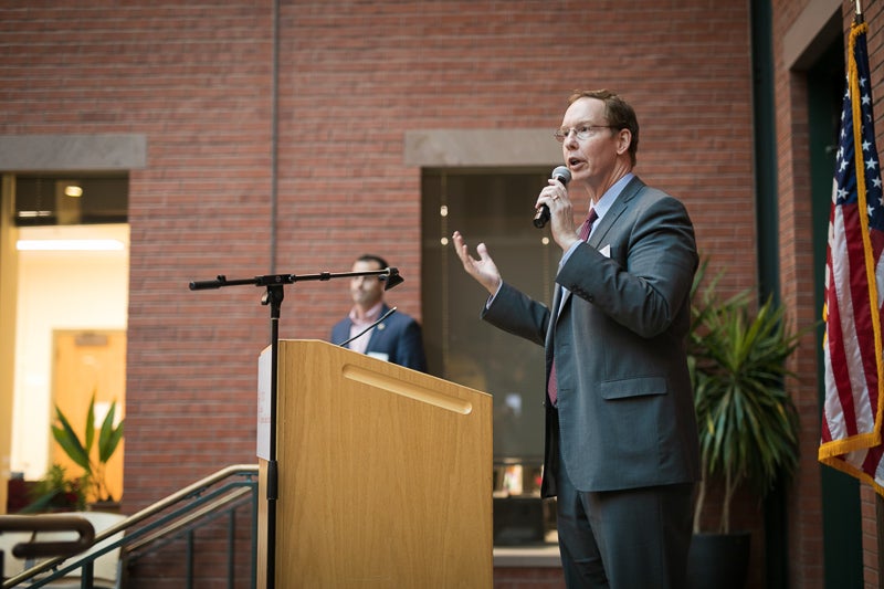 Dean Nelson at the podium