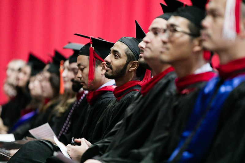 Photo of students listening to Dean Walsh