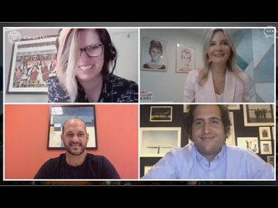 A screenshot, showing the four webinar panelists smiling during the online event.