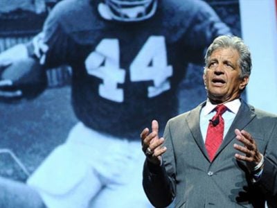 Photo of Ed Marinaro speaking