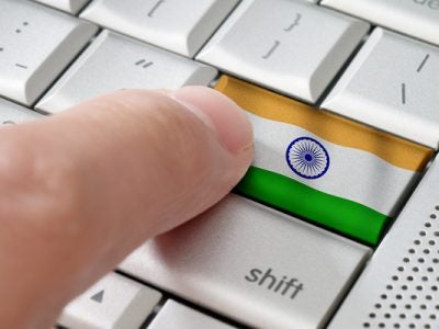 Keyboard with an Indian flag on the enter key