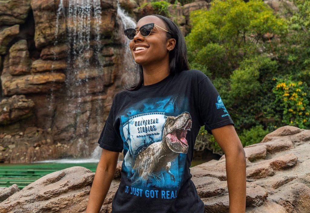 Faith wearing a Jurassic Park shirt