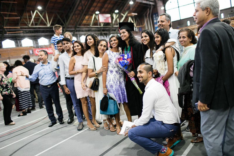 Photo of a family posing for photos