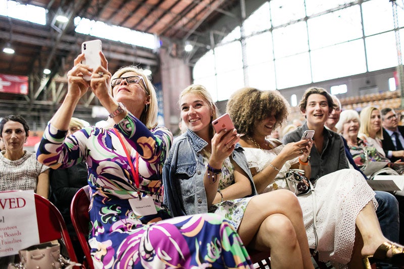 Photo of a family taking pictures