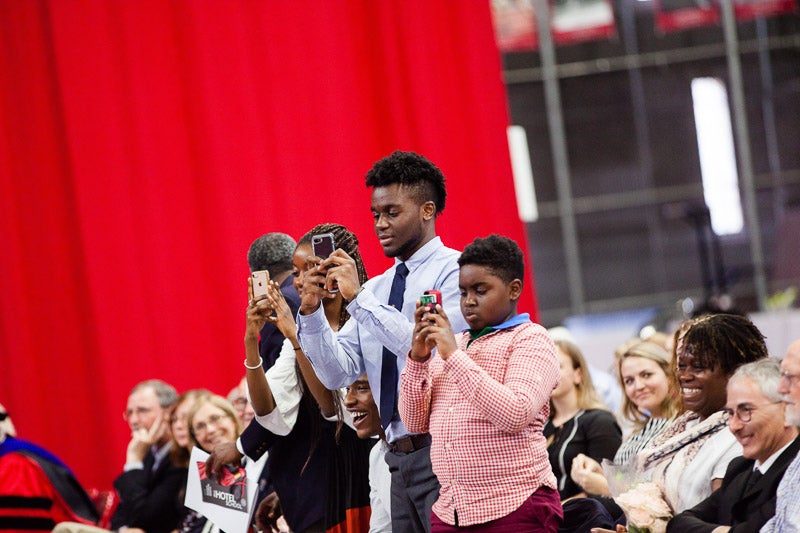 Photo of a family taking pictures
