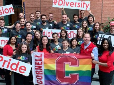 Dean Nelson and MBAs celebrate diversity and pride at a past Sage event.