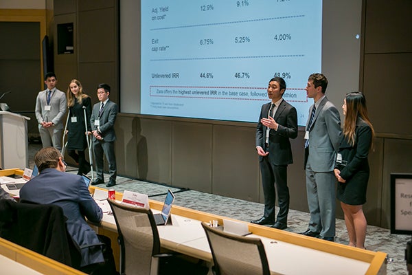 Photo of members representing Cornell&rsquo;s team, Fulcrum Capital, and team coach, Daniel Lebret, at the Real Estate Case Competition