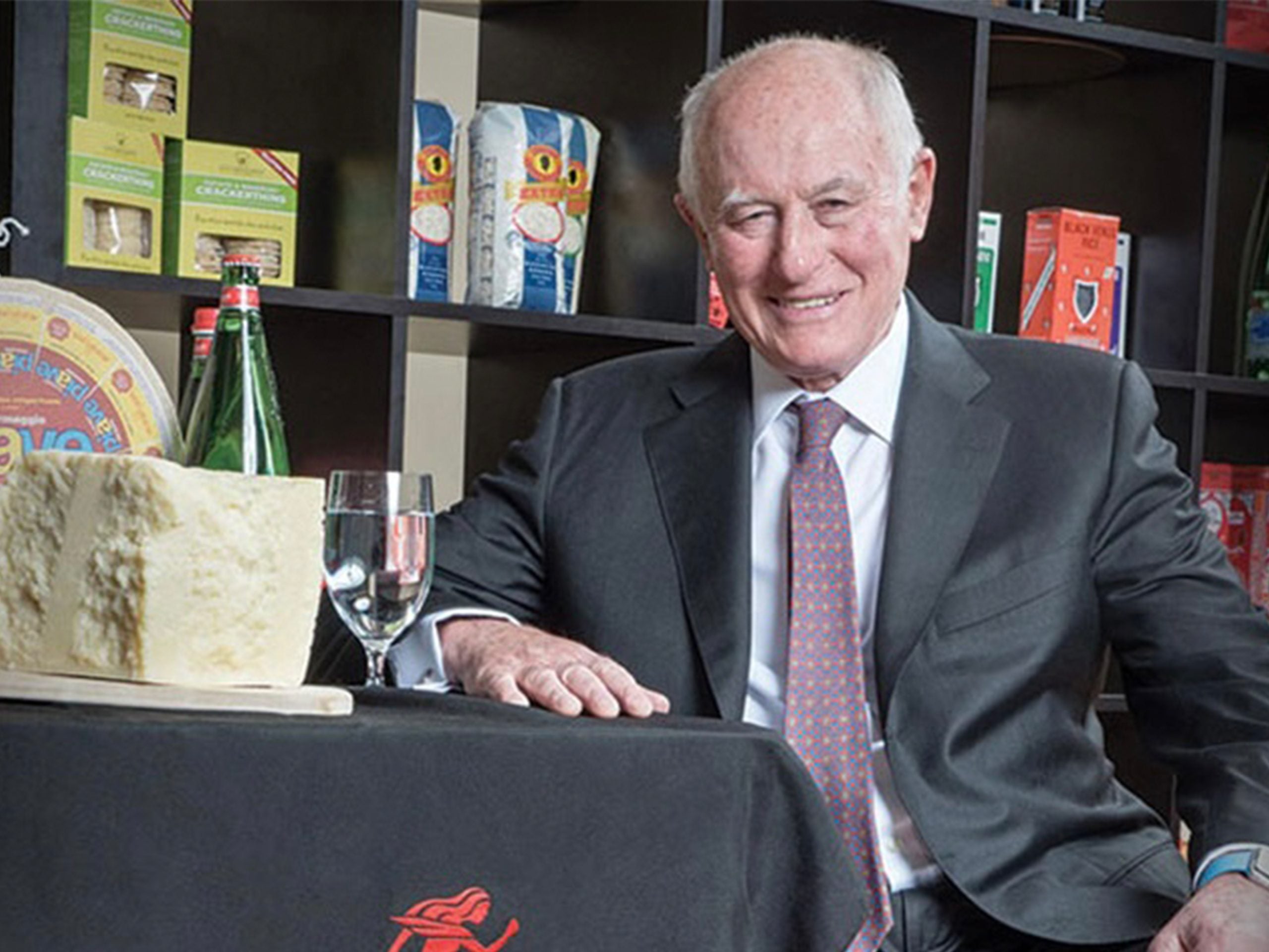 George Gellert poses with products from the Gellert Global Group.